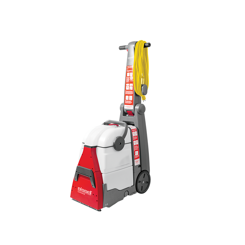 Bissell DC100 Compact Carpet Cleaner with upholstery kit, featuring a yellow power cord.