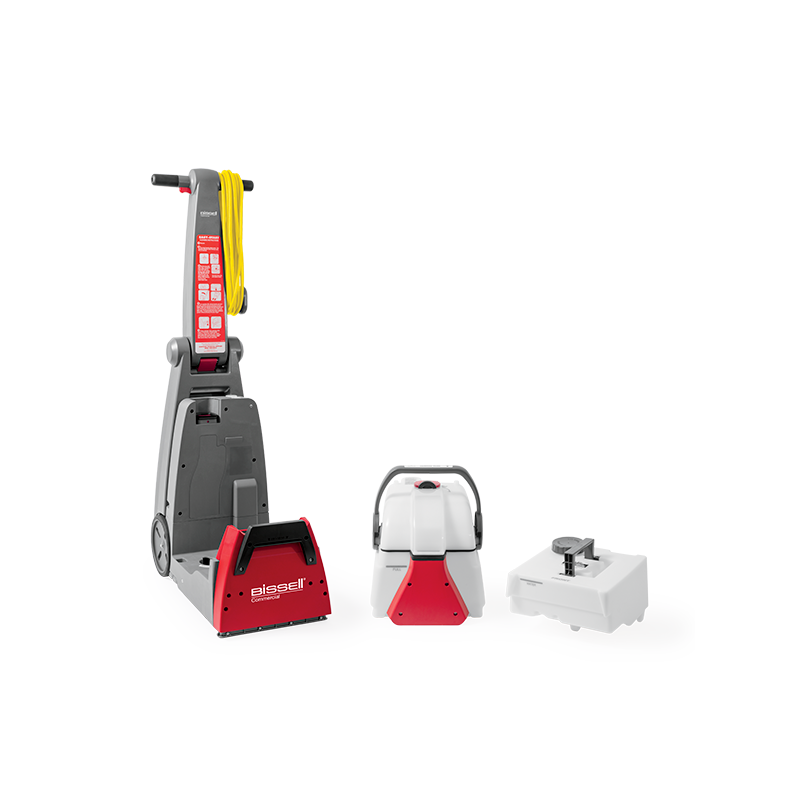 Bissell DC100 Compact Carpet Cleaner with Upholstery Kit and accessories displayed.