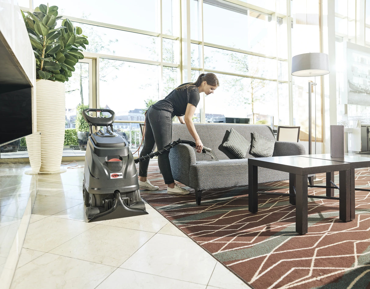 Viper CEX410 Carpet Extraction Machine in use for cleaning upholstery in a bright room.