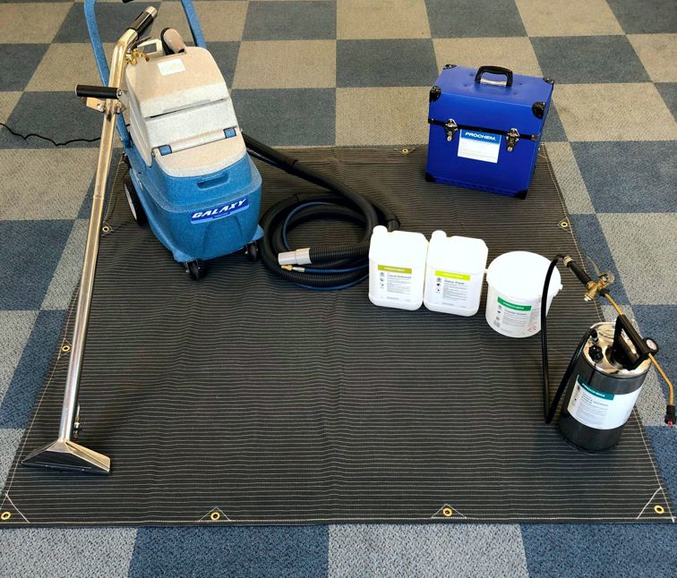 Grey Canvas Tarpaulin 1.8m × 1.8m - Heavy-duty protective cover with cleaning equipment arranged on it.