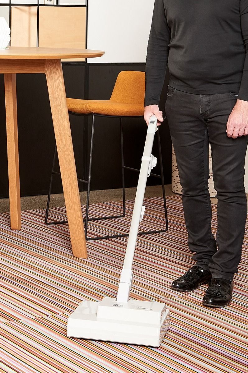 Sebo Duo-P Dry Carpet Machine 3000G in use on striped carpet.