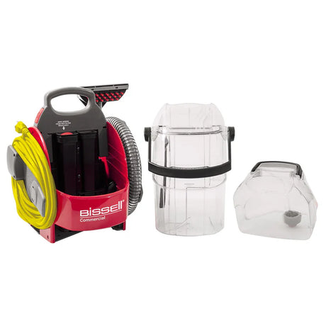 Bissell SC100 Carpet Spot Machine – compact carpet and upholstery spot cleaner with attachments.