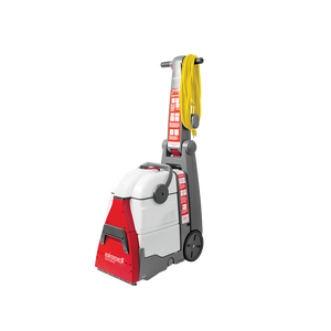 Bissell DC100 Compact Carpet Cleaner with upholstery kit, featuring a yellow power cord.
