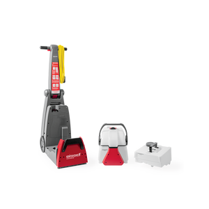 Bissell DC100 Compact Carpet Cleaner with Upholstery Kit and accessories displayed.