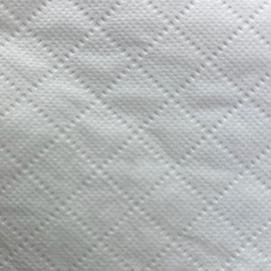 Close-up texture of Jangro Premium Triple Soft Toilet Tissue, 3-ply, white.