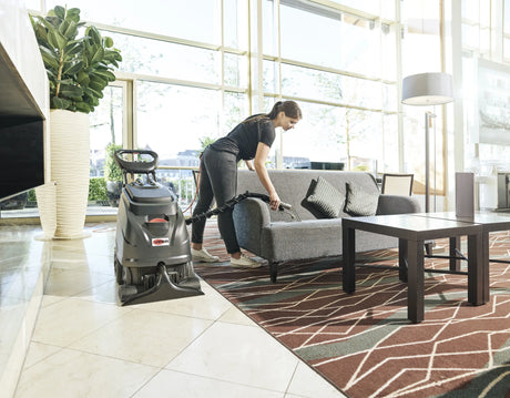 Viper CEX410 Carpet Extraction Machine in use for cleaning upholstery in a bright room.