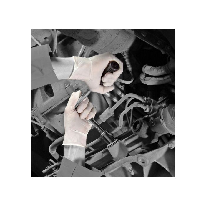 Hands wearing Jangro Latex Powder-Free Gloves working on a vehicle's engine components.