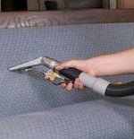 Prochem Steempro 2000 PowerFlo SX2000 – upholstery cleaning tool in use.