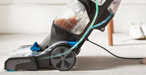 Vax Platinum SmartWash Carpet Cleaner – automatic carpet washing machine with visible dirty water tank.