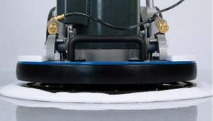 Orbot Vibe SprayBorg Carpet Cleaning Machine - close-up of cleaning pad and base.